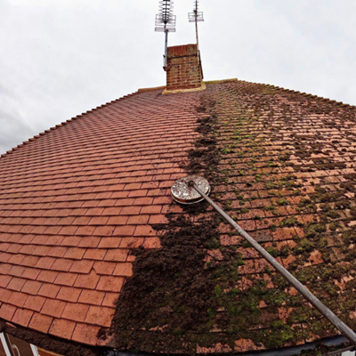 Roof being cleaned